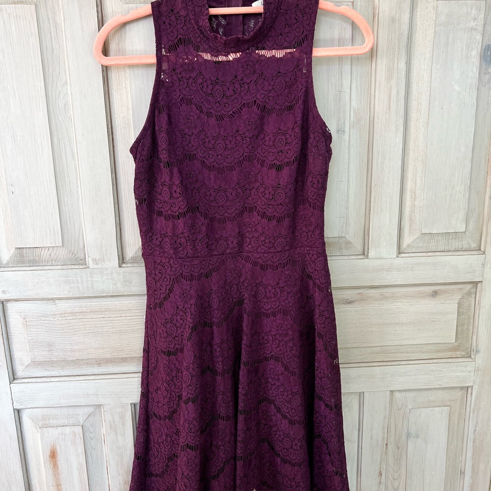 Sleeveless, maroon, lace print dress.